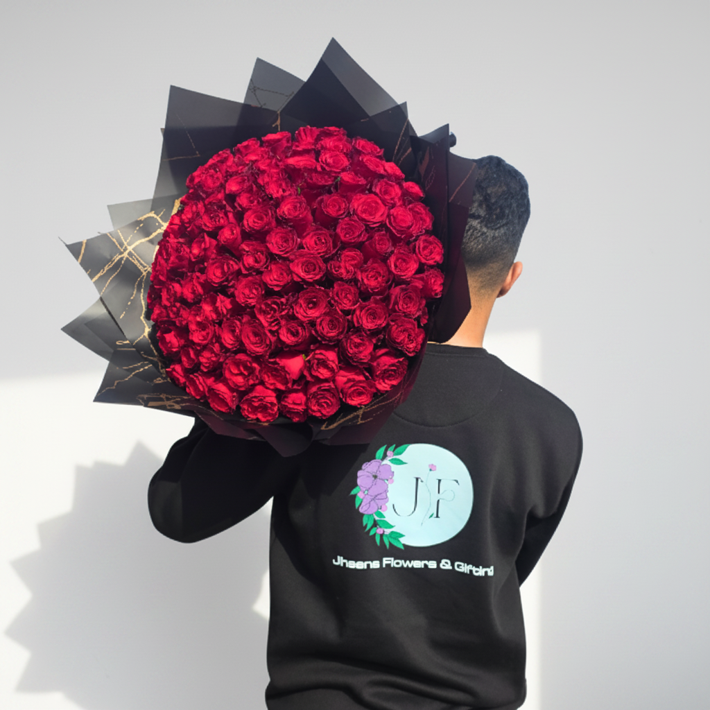 Red roses bouquet with 60 stems, featuring vibrant, fresh roses arranged in a beautiful display.
