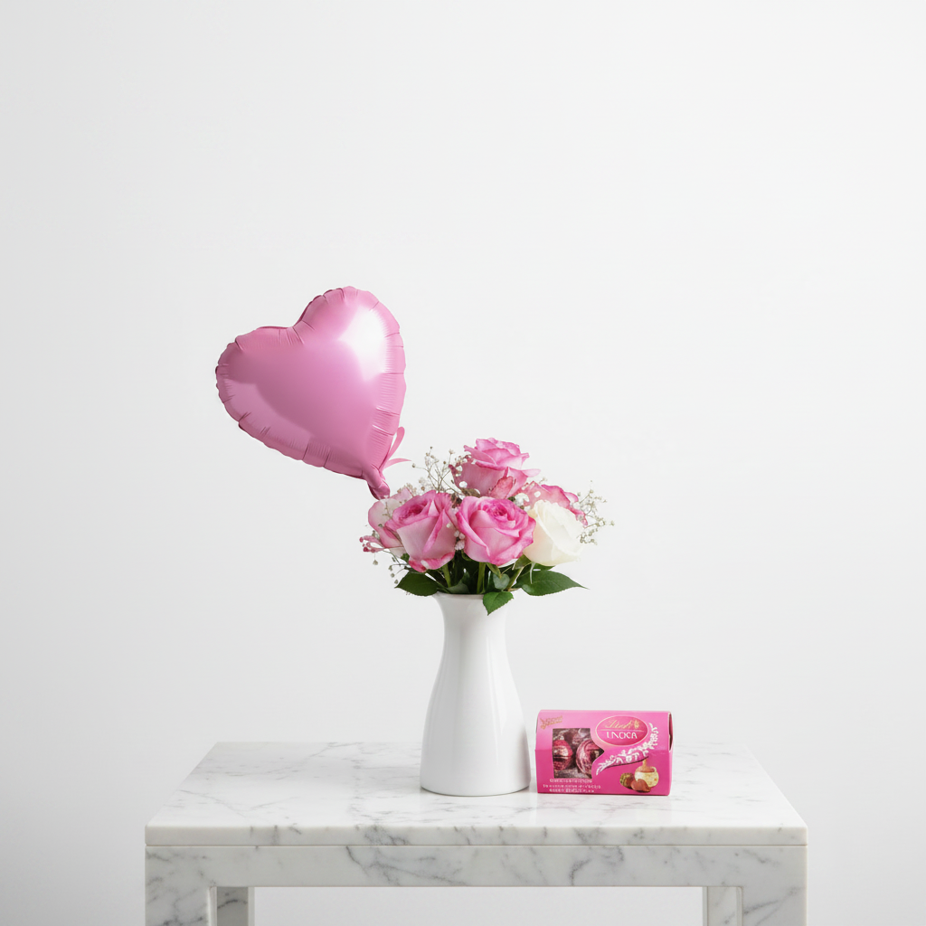 Pink Dreams Set from Jihaans Flower Emporium featuring pink floral arrangements with lush greenery and decorative accents.