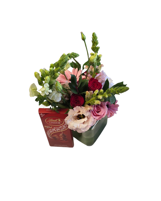 Cupid and Lindt gift set with chocolates and a decorative vase, perfect for edible gifts and special occasions.