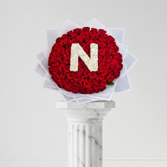 Bouquet of 100 colorful roses from My Store with a personalized letter, arranged in a lush, vibrant display.