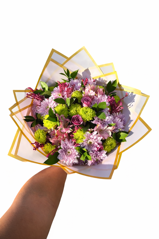 Colorful gift bunch from My Store featuring a variety of fresh flowers arranged as a charming gift presentation.