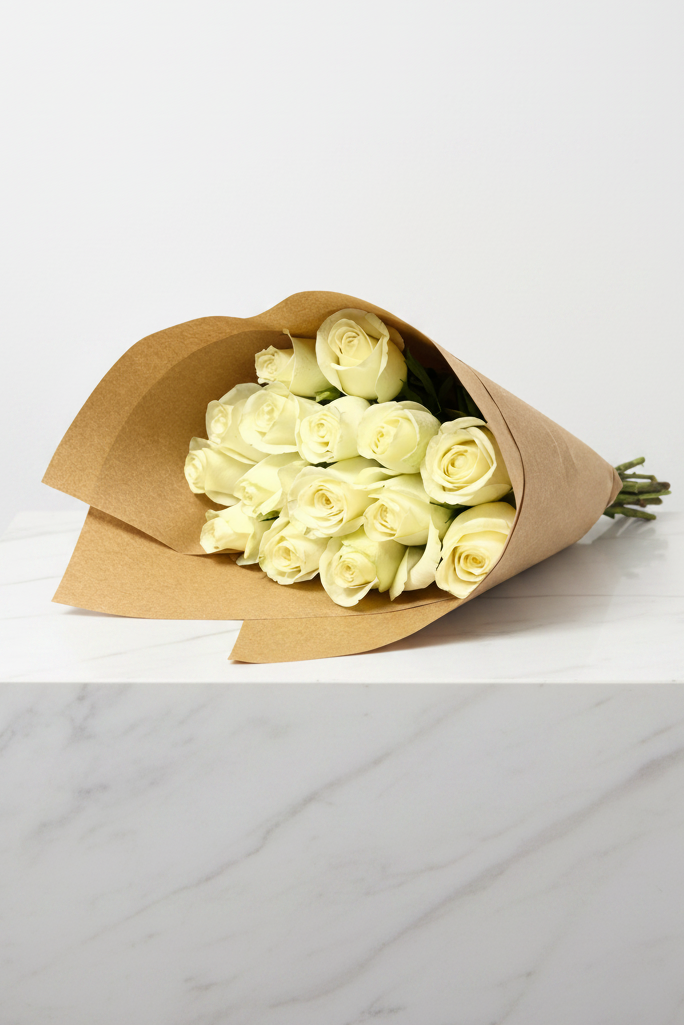 15 stem white roses arranged in a bouquet, showcasing elegant white petals and green foliage, perfect for gift or decoration.