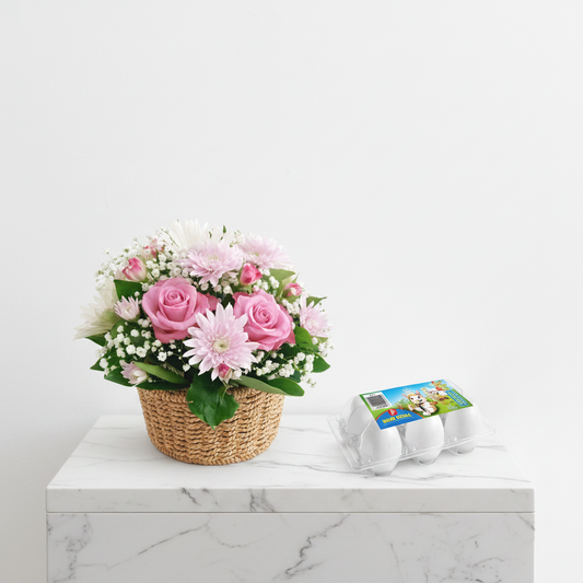 Sweet Easter basket with colorful flowers and festive decorations from Jihaans Flower Emporium, perfect for holiday celebrations.