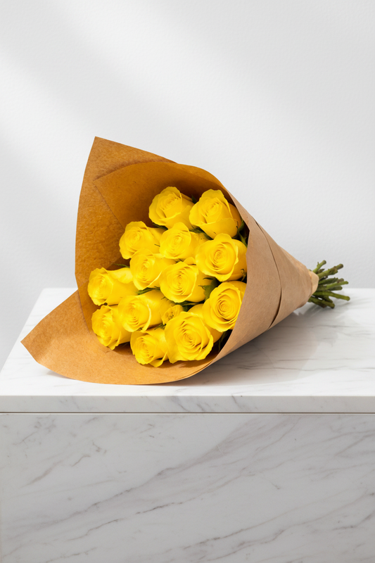 Bright yellow roses with 15 stems, fresh and vibrant, arranged in a natural bouquet. Perfect for gifting or decoration.