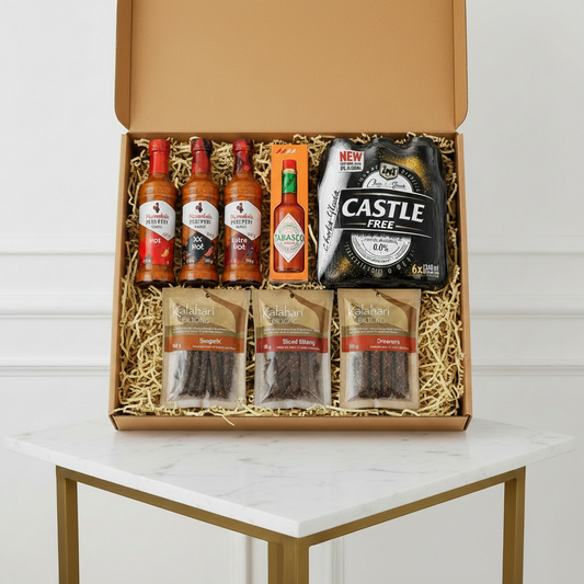 Gift box featuring braai tools and accessories for outdoor grilling, ideal for sharing with friends on a braai occasion.