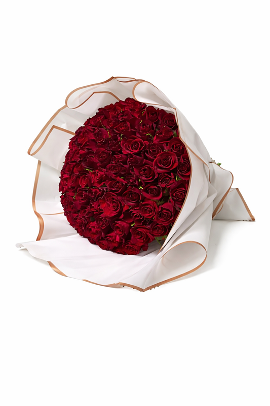 Vivid red roses arranged in a bouquet, showcasing fresh, lush blooms perfect for romantic or special occasions.
