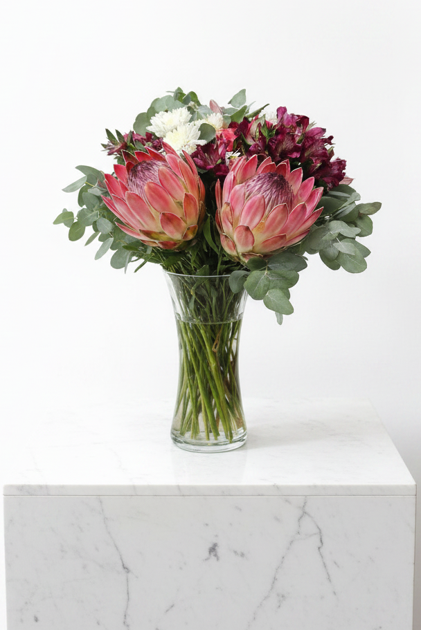 Elegant glass vase with fresh pink and white flowers from the Perfect Impression Bloom collection by My Store.