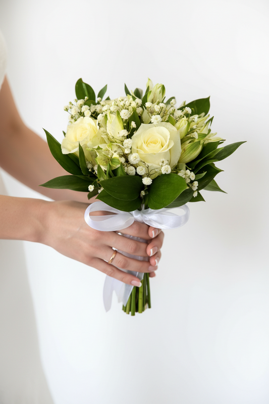 White floral fairy garden bouquet featuring delicate white flowers and greenery, perfect for fairy garden decor.