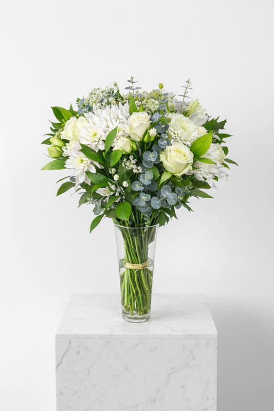 White Sympathy Flower Bunch with Vase from My Store, featuring elegant white blooms arranged in a clear glass vase.