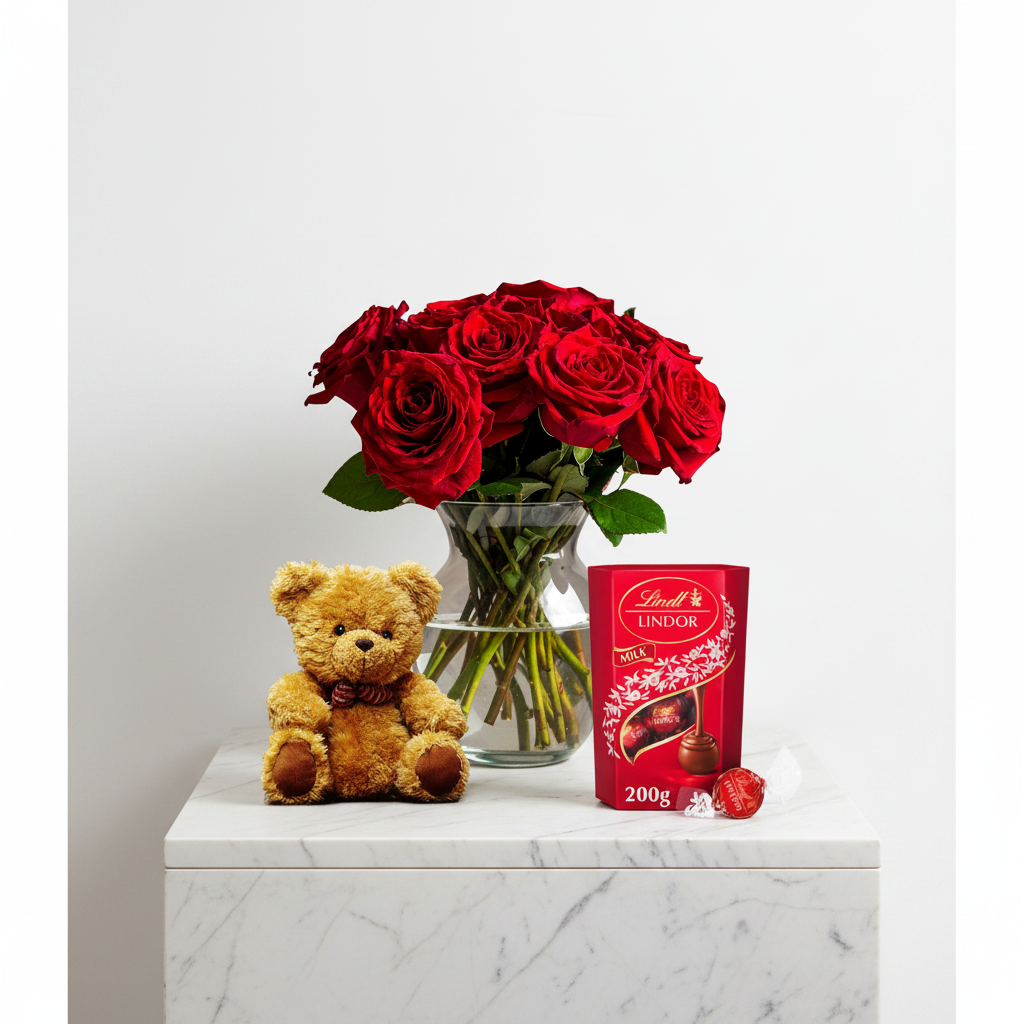 Romantic gift set with red roses and plush teddy bear, perfect for special occasions, featuring fresh floral roses and a cuddly teddy.
