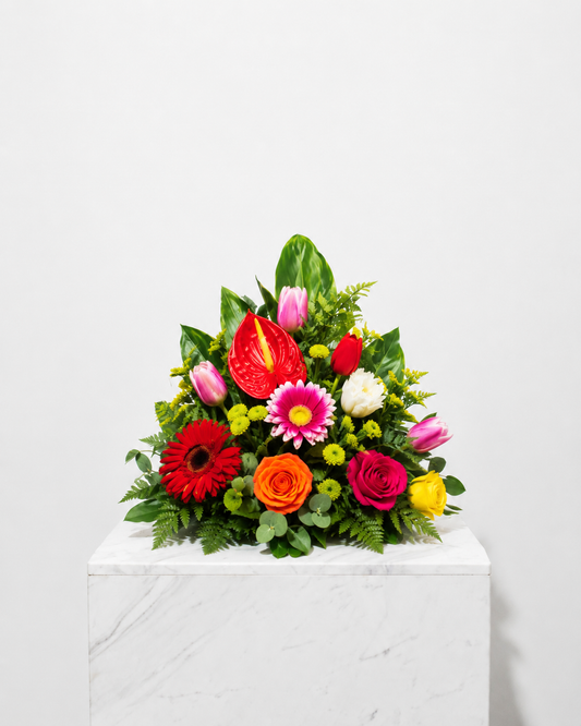 Colourful Tulip based upright Arrangement