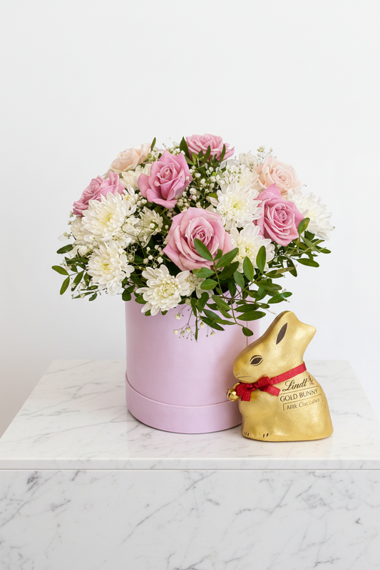 Golden Easter Bloom Box from Jihaans Flower Emporium featuring a vibrant floral gift box with colorful spring flowers.