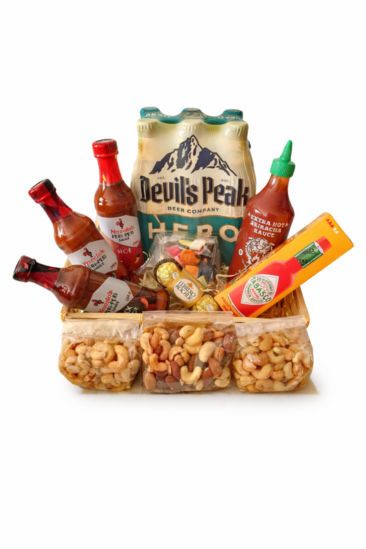 Gift box featuring a braai-themed gift set for men, including accessories perfect for outdoor grilling with friends.