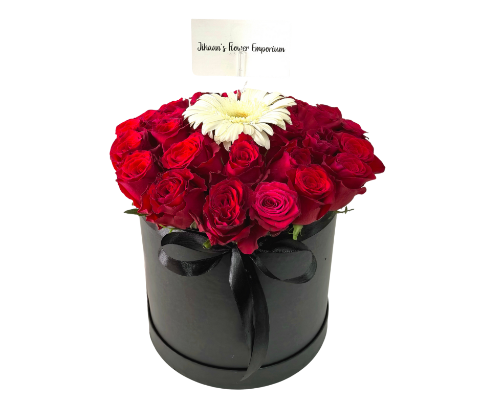 A Daisy amongst Roses bucket - Jihaans Flower Emporium