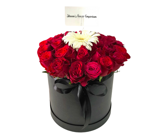 A Daisy amongst Roses bucket - Jihaans Flower Emporium