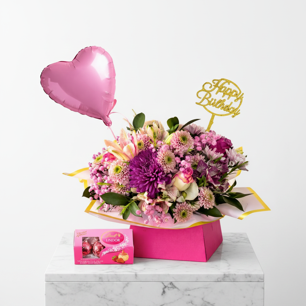 Pink Celebration Bloom Box gift set from Jihaans Flower Emporium featuring vibrant pink floral arrangements and decorative packaging.